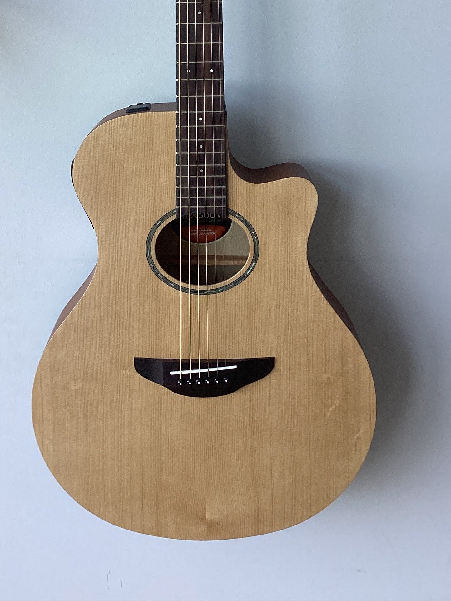 Image of Acoustic guitar on a white background