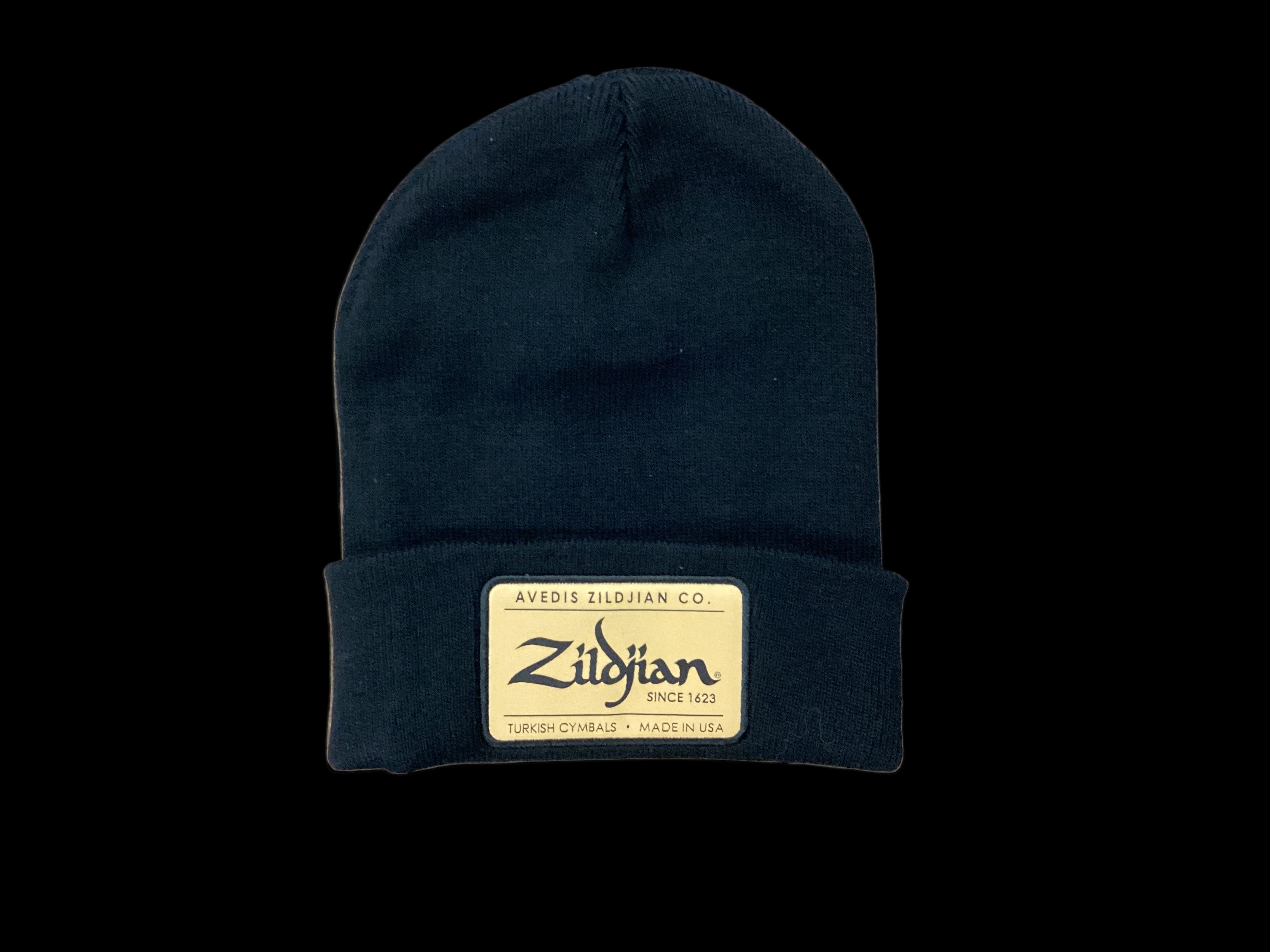 Image of Black beanie with Zildjian logo on a wooden surface