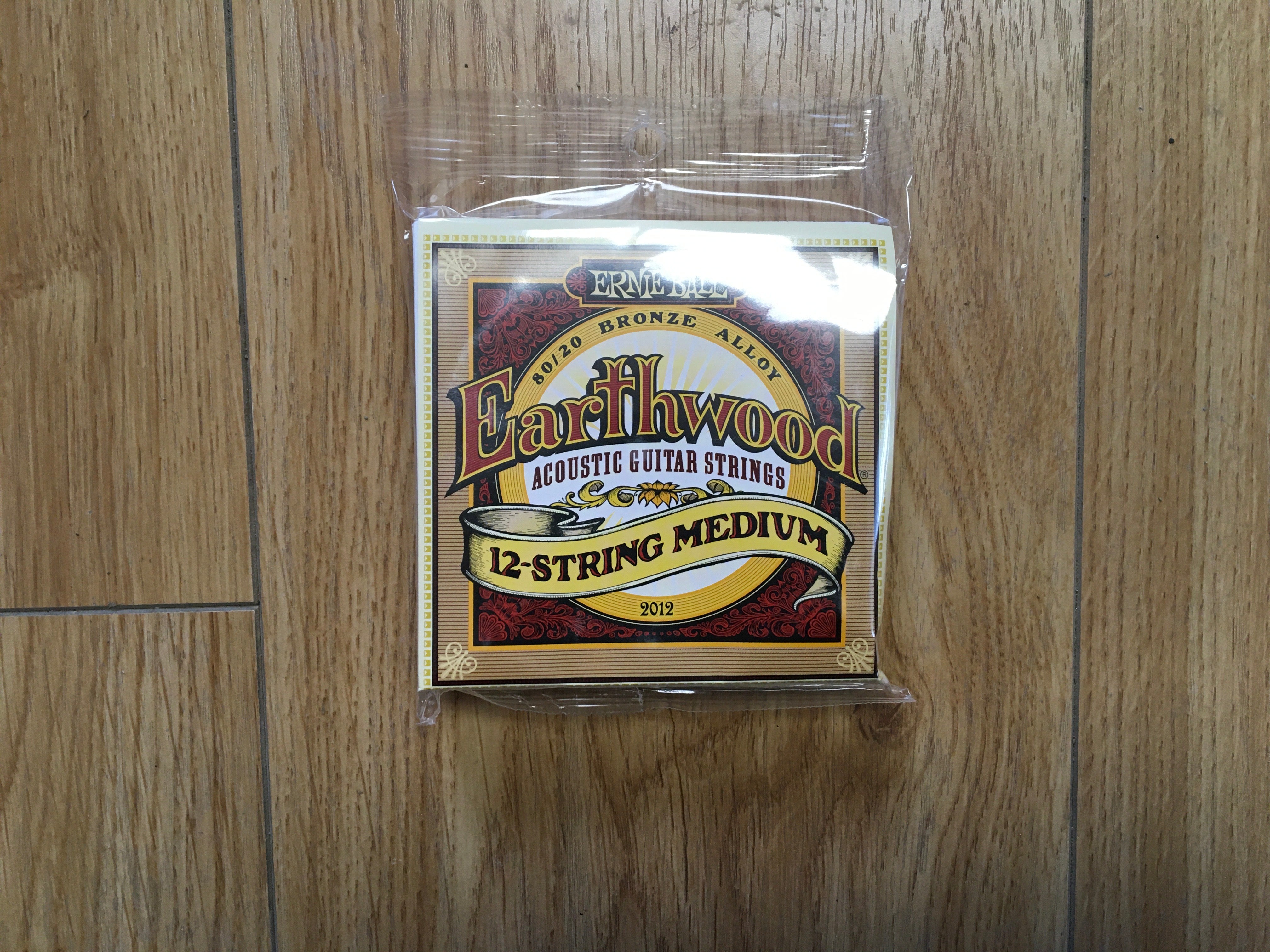 Image of Ernie Ball Medium Earthwood 80/20 Bronze 12-String Acoustic Guitar Strings 11-52 Gauge
