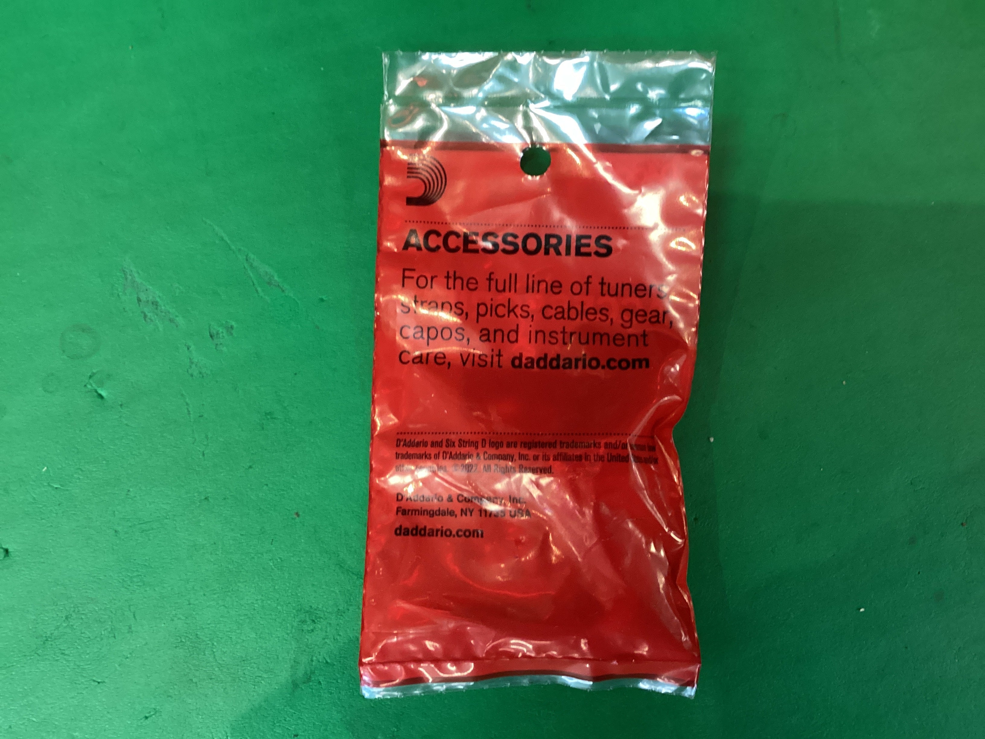 Image of D’Addario Plastic Bridge Pins (7) + End Pin (1) Ivory w/black dots