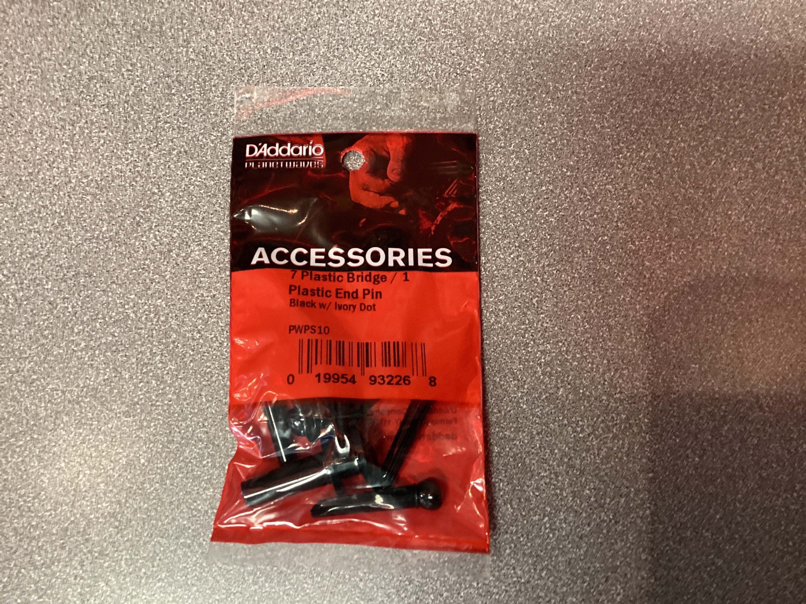 Image of D’Addario Plastic Bridge Pins (7) + End Pin (1) Black w/Ivory dot