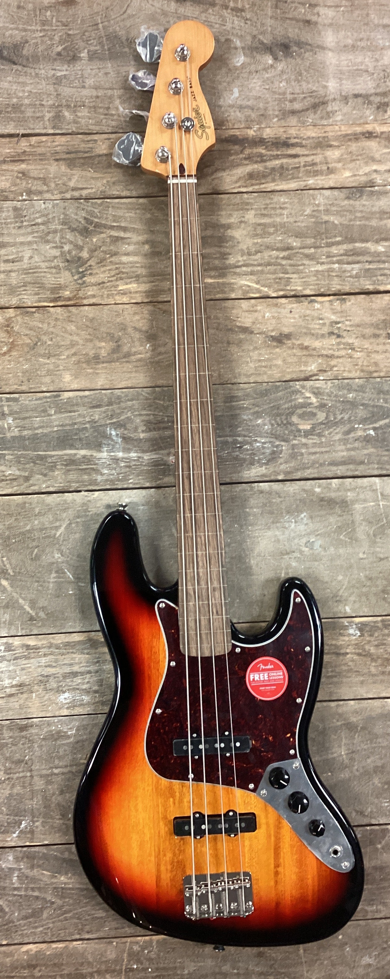 Image of Squier Classic Vibe '60s Jazz Bass® Fretless, Laurel Fingerboard, 3-Color Sunburst