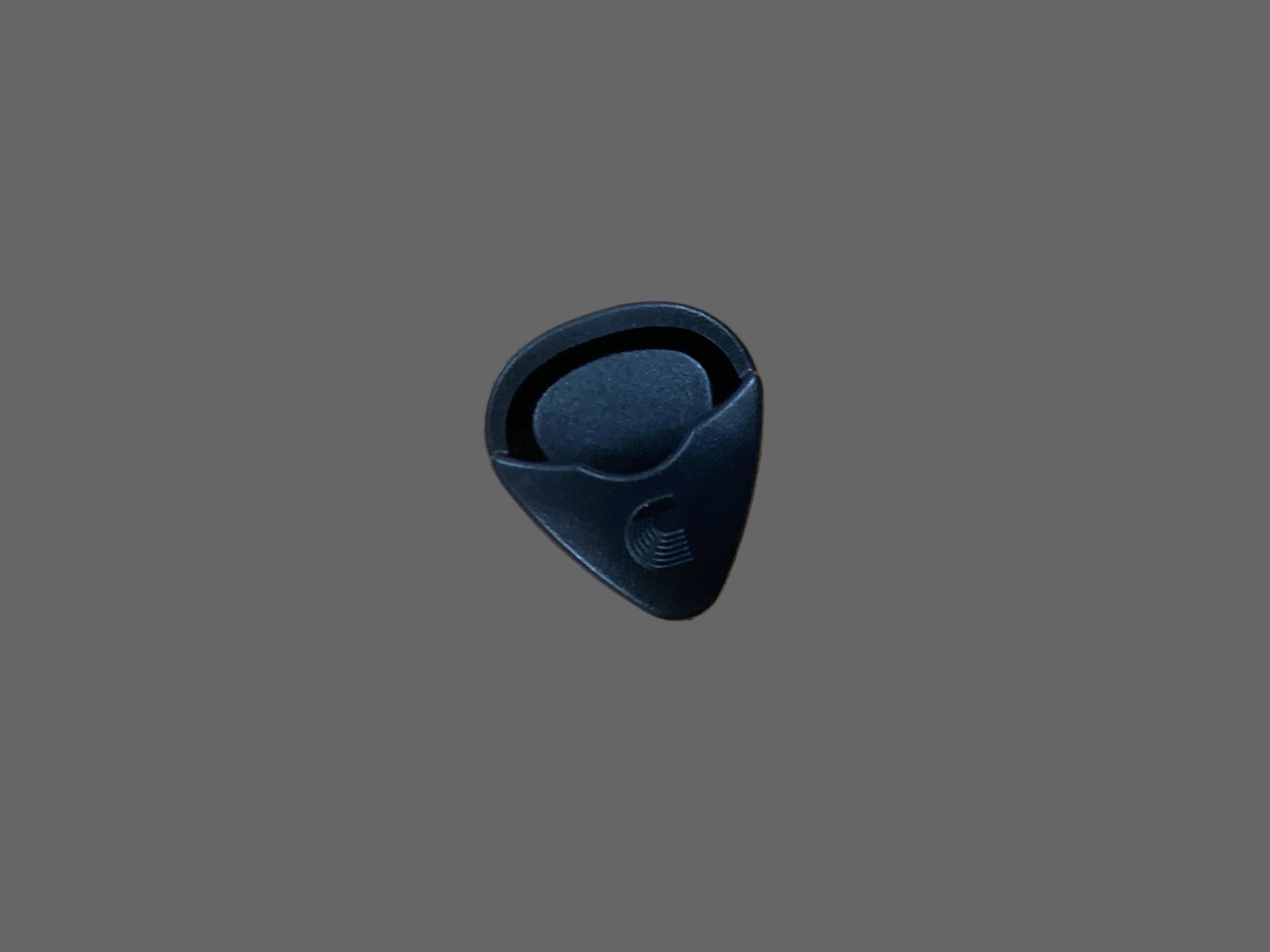 Image of Blue guitar pick on a gray background