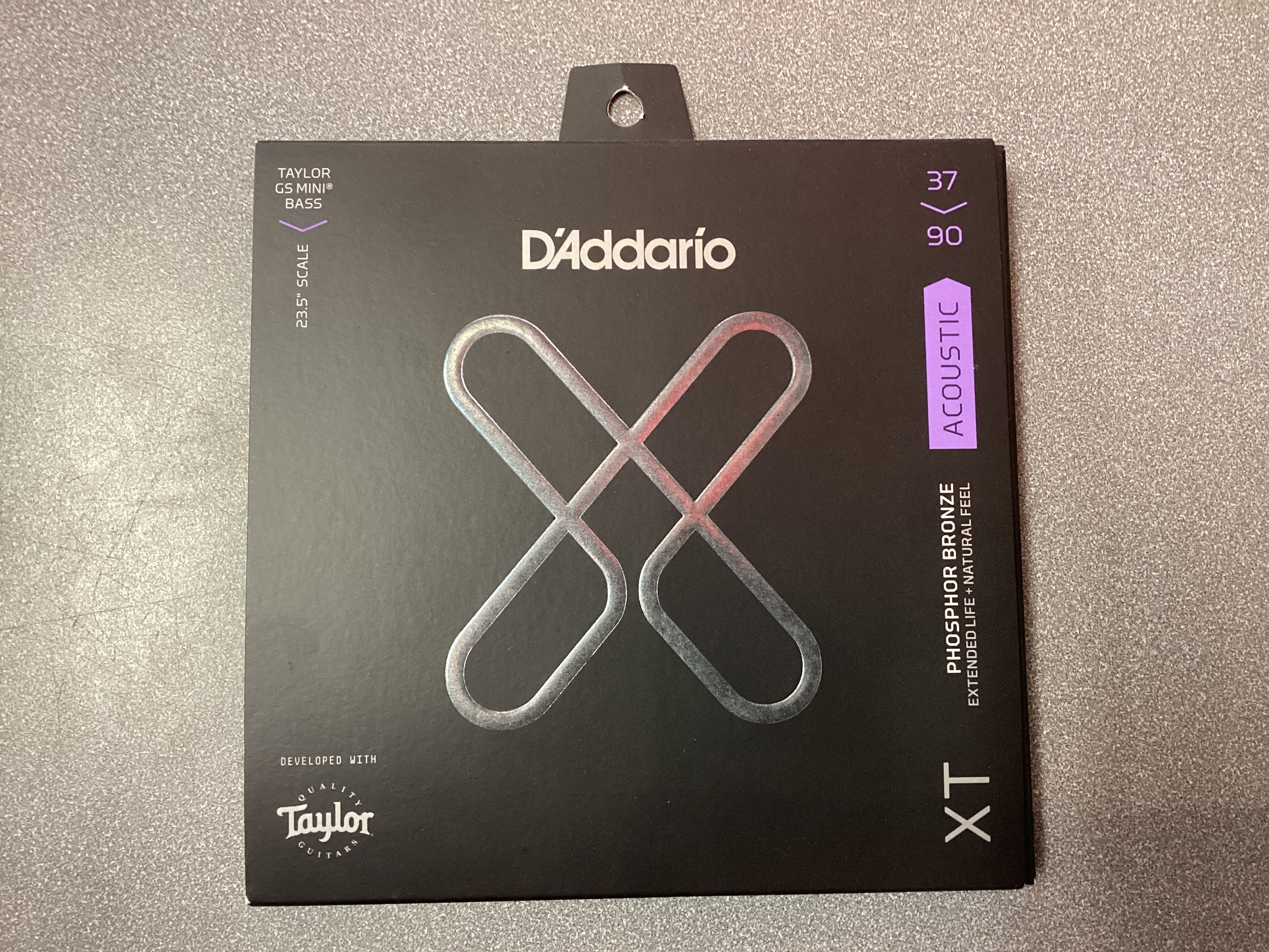 Image of A pack of D’Addario XT Taylor GS-Mini acoustic bass strings with the gauge indicators of 37-90 visible on the front.