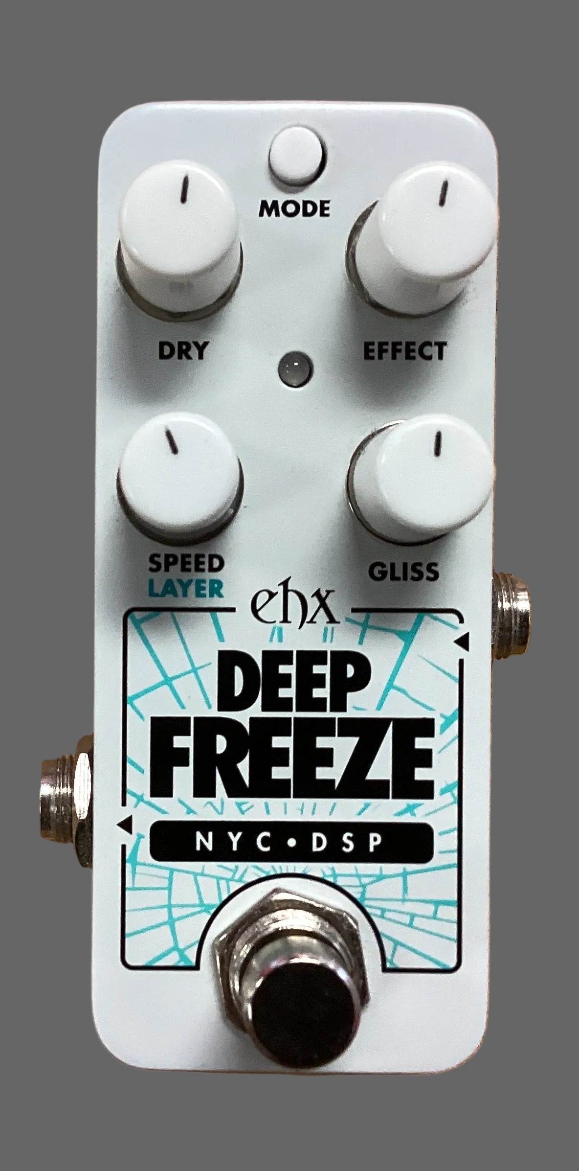 Image of Guitar effects pedal named 'Deep Freeze' on a wooden surface