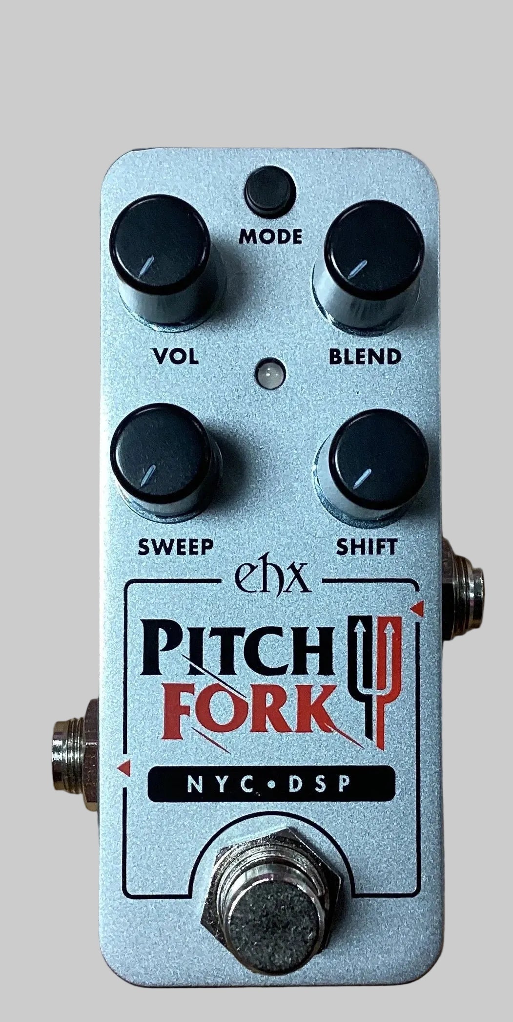 Image of Pitch Fork electronic guitar effects pedal with control knobs on a gray background