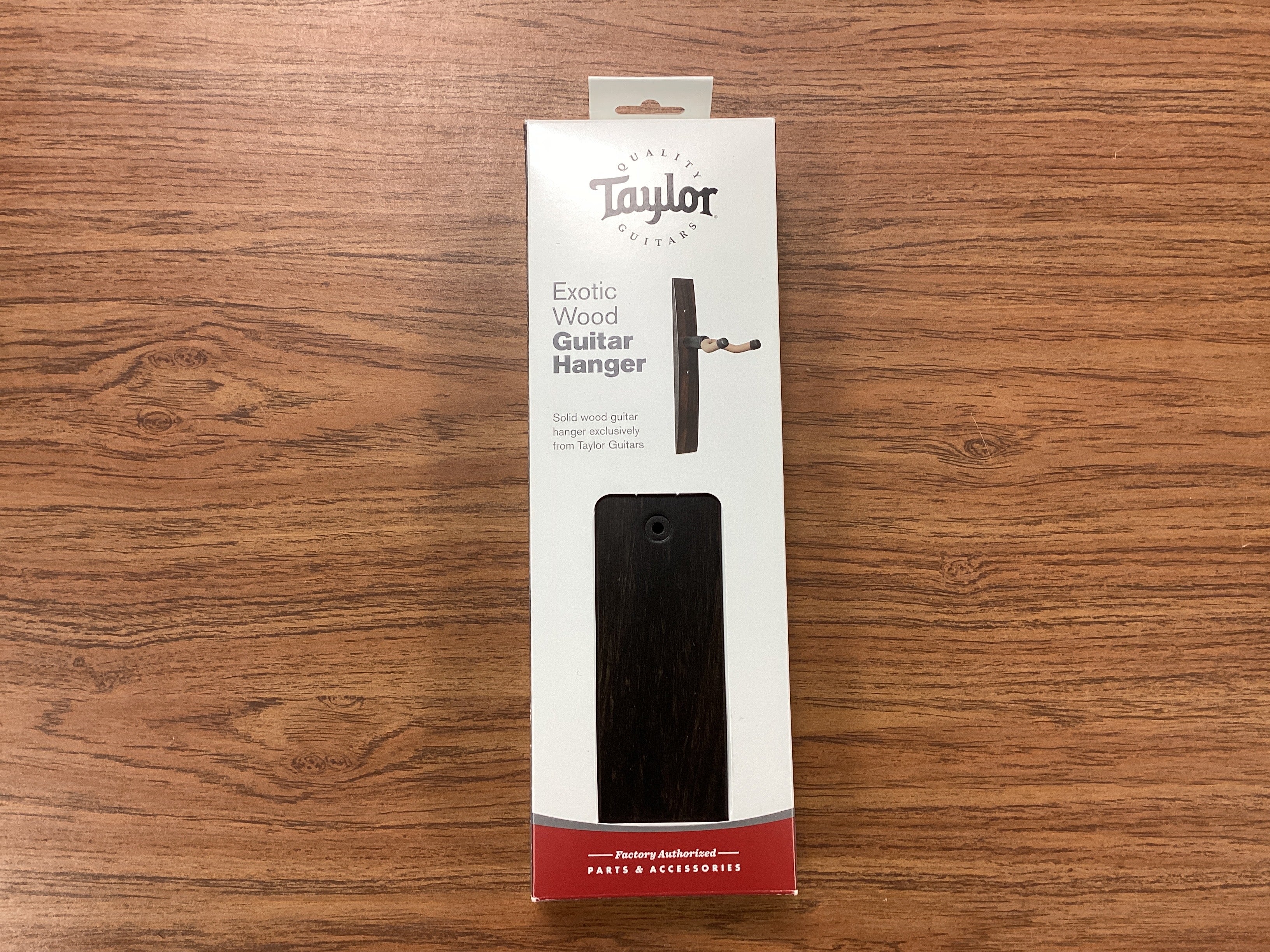 Image of Taylor Guitar Wall Hanger - Ebony, No Inlay