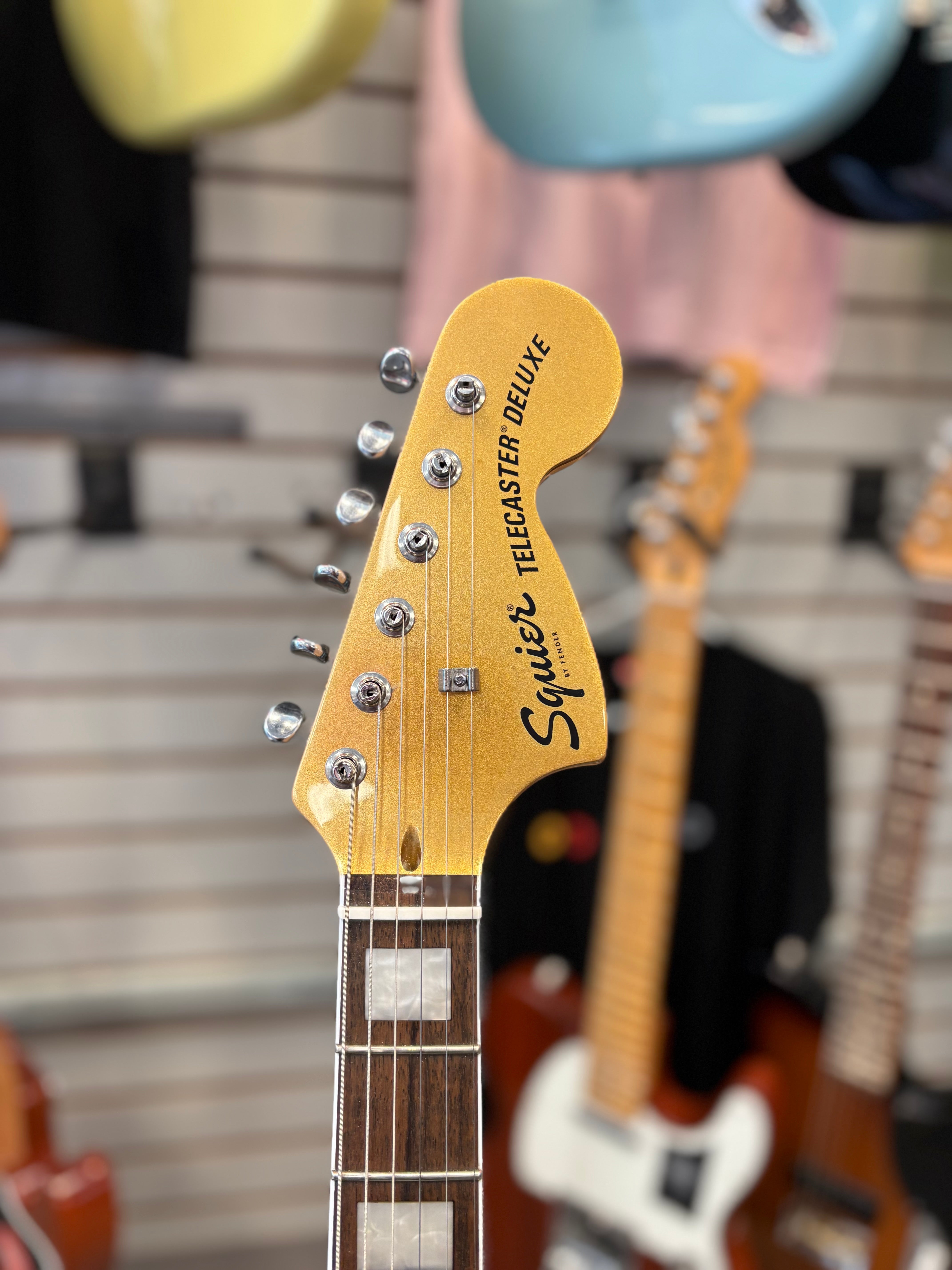 Image of FENDER Limited Edition Paranormal Troublemaker Telecaster® Deluxe, Laurel Fingerboard, Parchment Pickguard, Aztec Gold