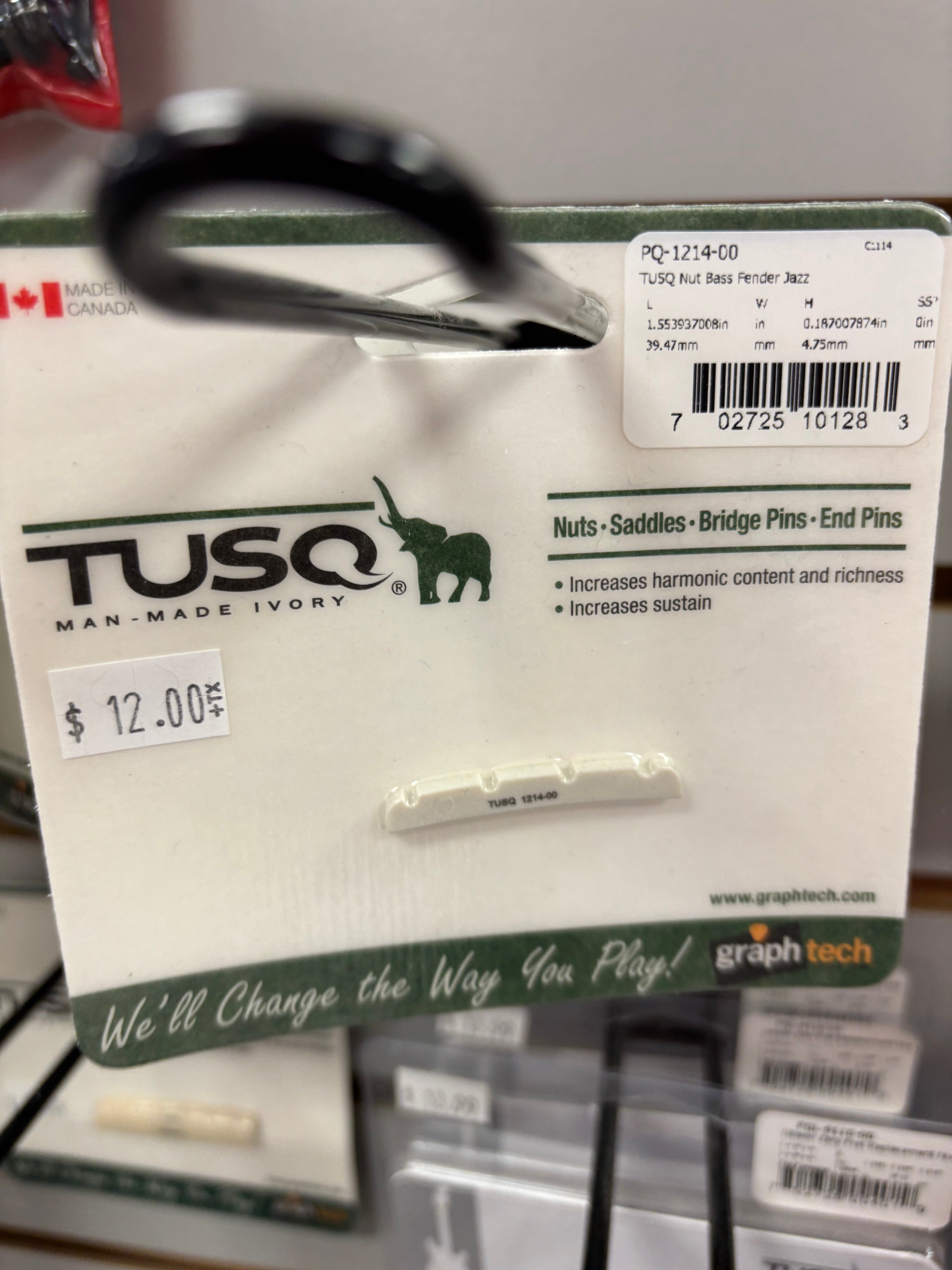 Image of TUSQ Fender 4-String Jazz Bass Slotted Nut Ivory