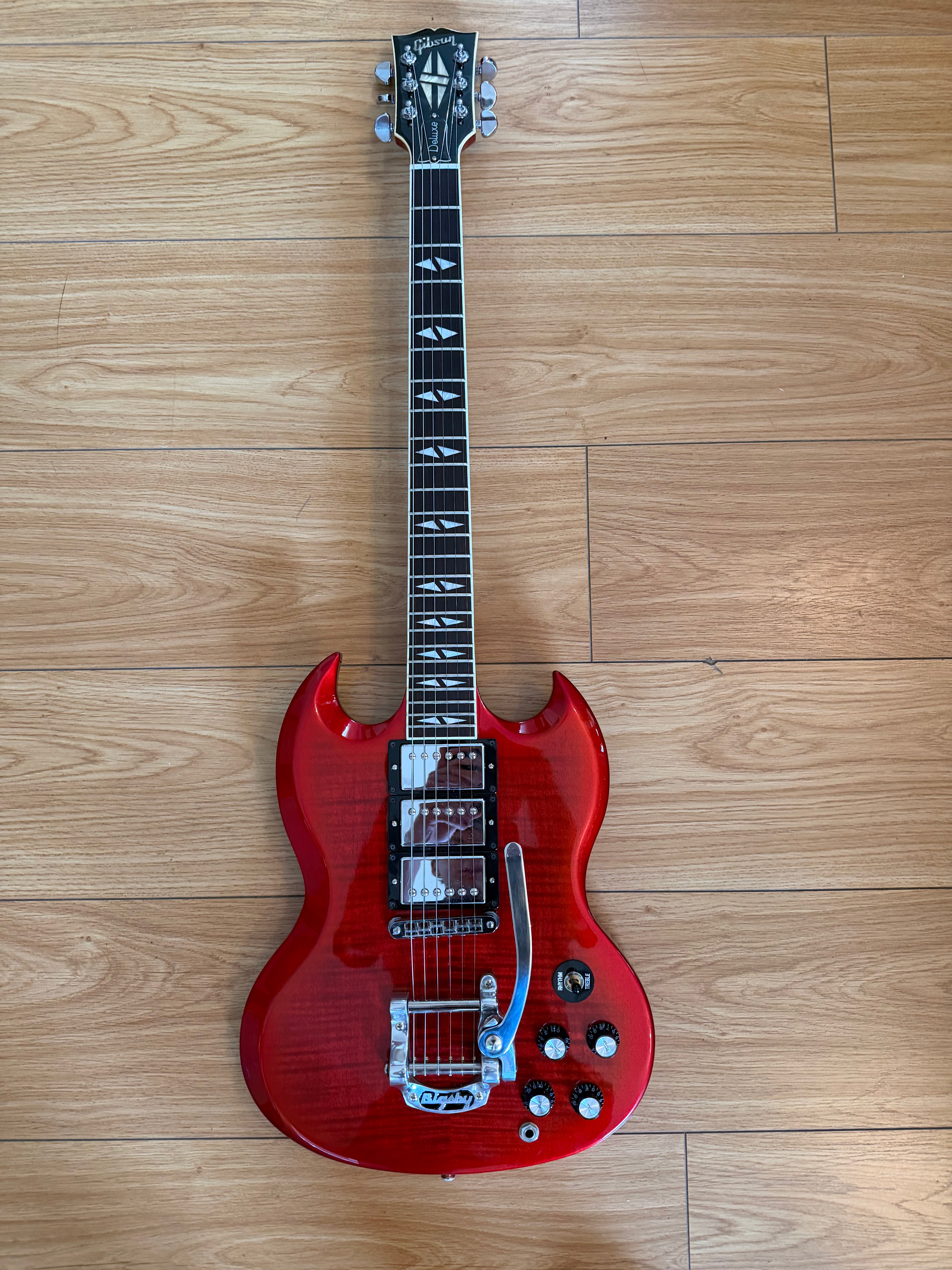 Image of Pre owned Gibson SG Deluxe (2013) in Red Fade