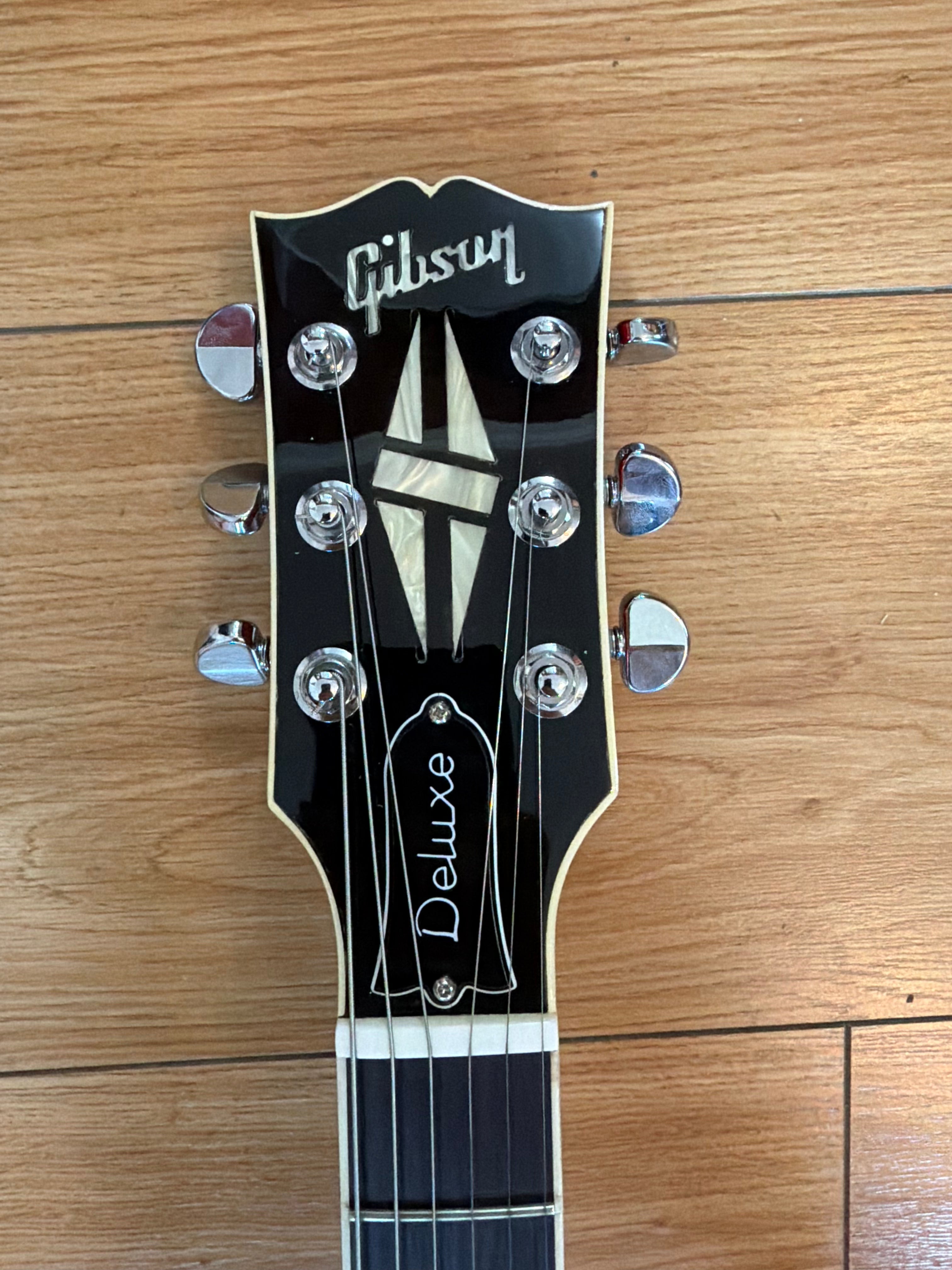 Image of Pre owned Gibson SG Deluxe (2013) in Red Fade