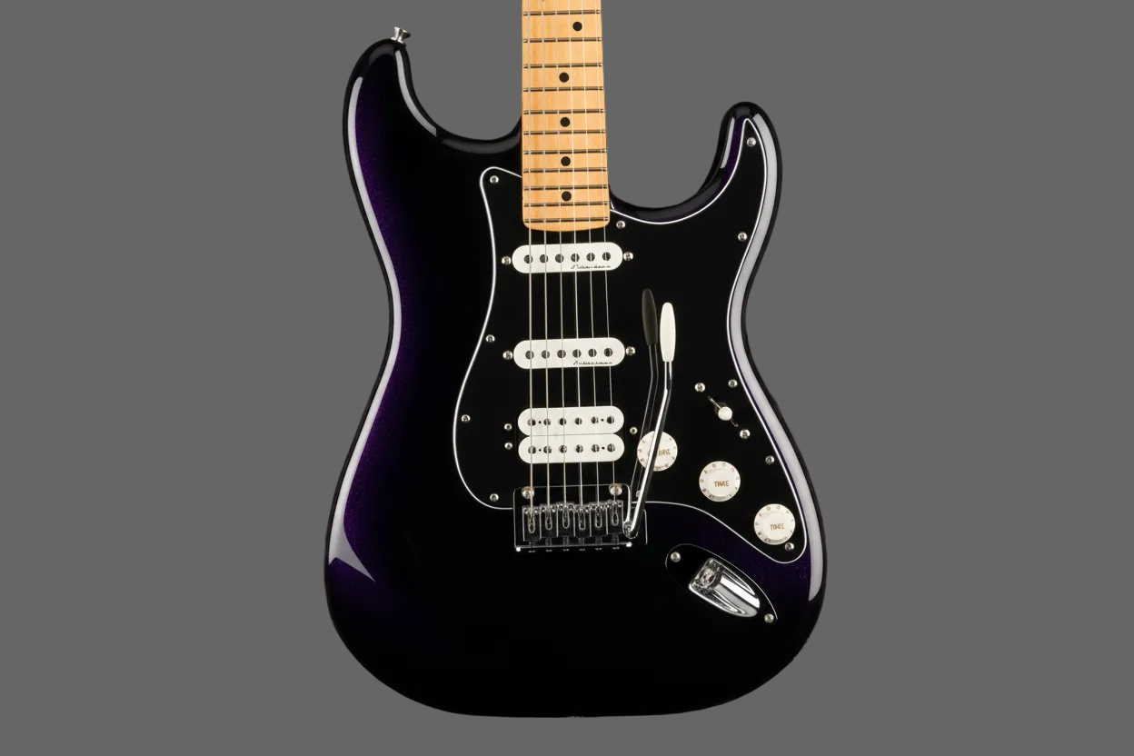 Image of Close-up of a black electric guitar with a purple finish on a dark background